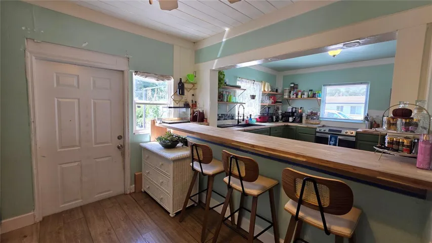 Breakfast Bar and Seating overlooking Kitchen, Back Door Entry