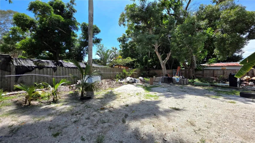 Backyard, Oversized Lot, Fully Fenced, Side driveway with Gated Entry to Backyard, Smaller Driveway on Back of Lot