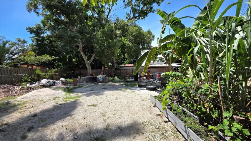 Backyard, Oversized Lot, Fully Fenced, Side driveway with Gated Entry to Backyard, Smaller Driveway on Back of Lot