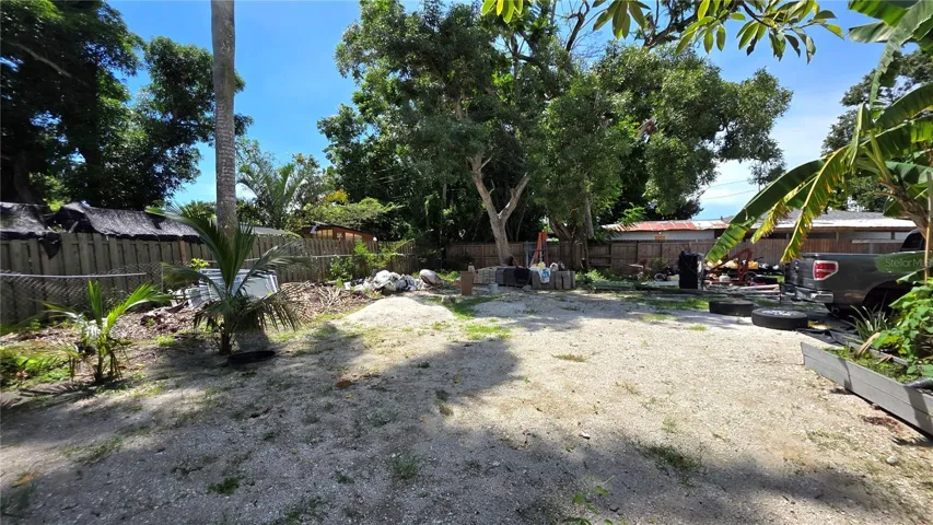 Backyard, Oversized Lot, Fully Fenced, Side driveway with Gated Entry to Backyard, Smaller Driveway on Back of Lot