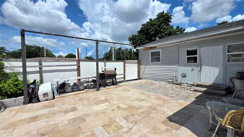 Pavered/Tiled back patio, Back Door Entry