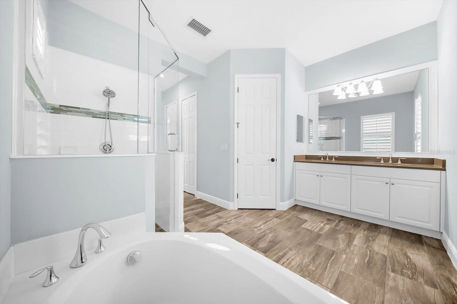 Primary Suite Bathroom with Private Water Closet