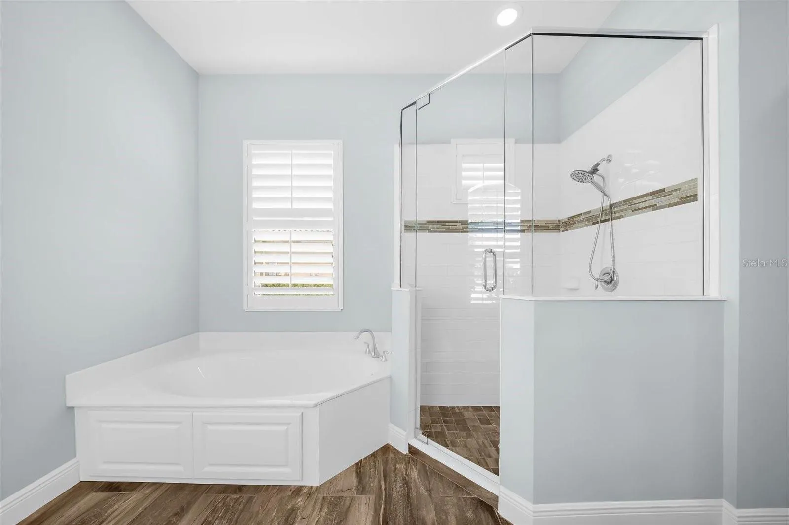 Primary Suite with Walk In Shower & Tub