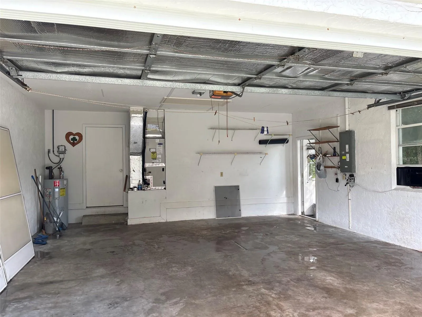 Two car garage with man door