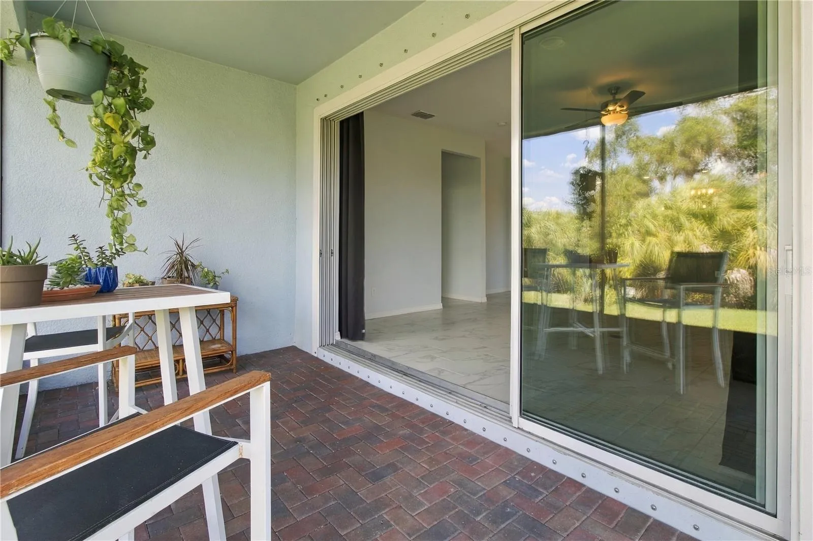 Triple Slider to Pavered Lanai