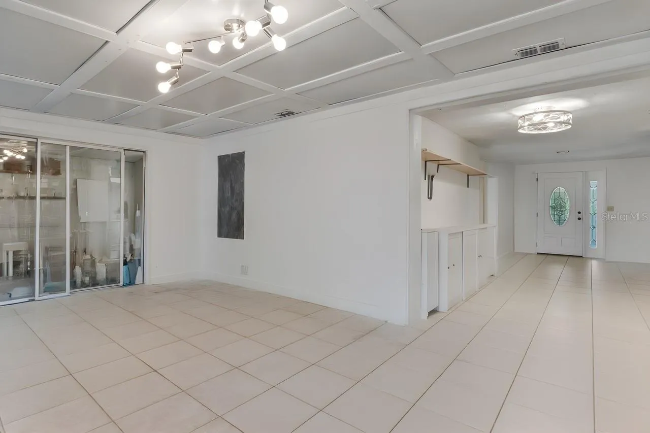 Dining and family room w/out furniture and art supplies