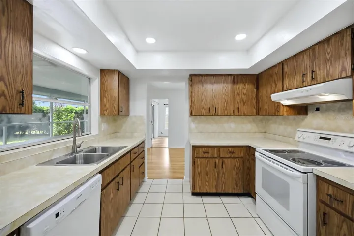 Kitchen with large pass-through window.
