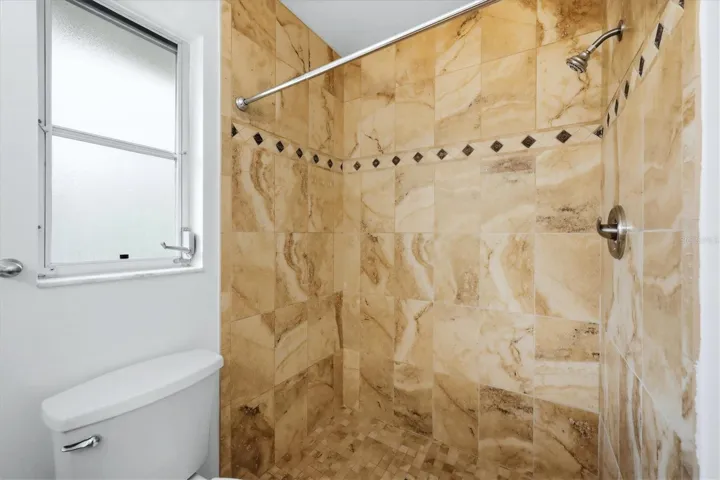 Primary bathroom shower.