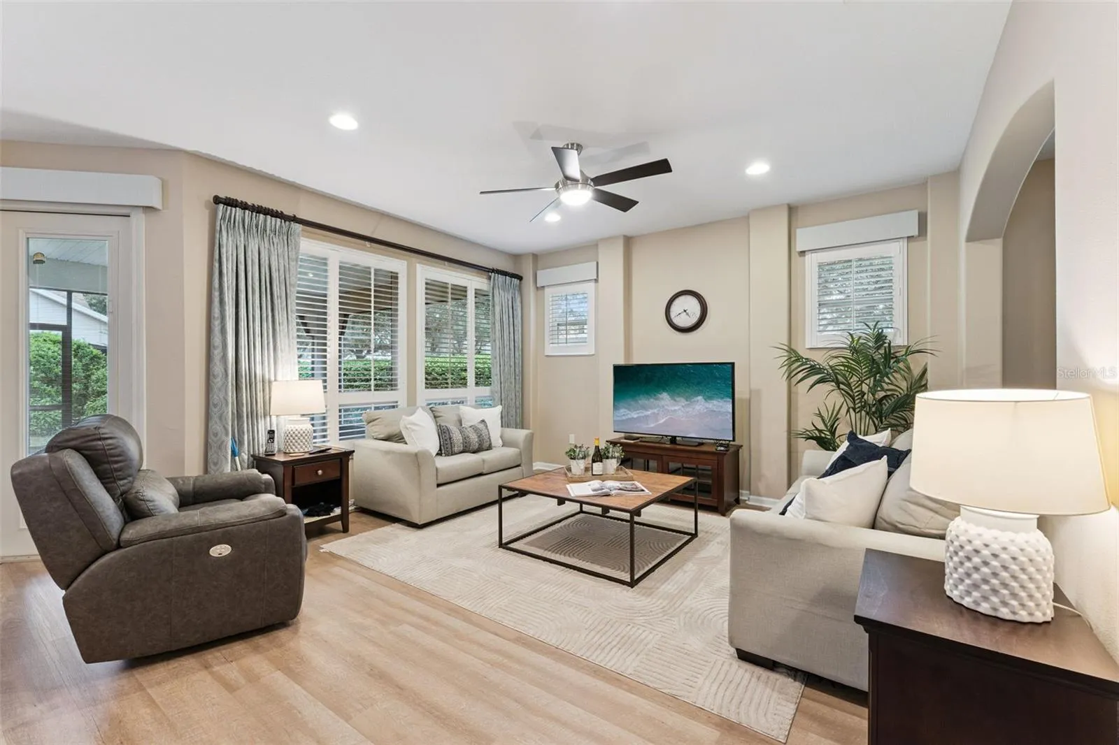 13' x 15' Great Room w/ recessed lighting, ceiling fan & Plantation style shutters