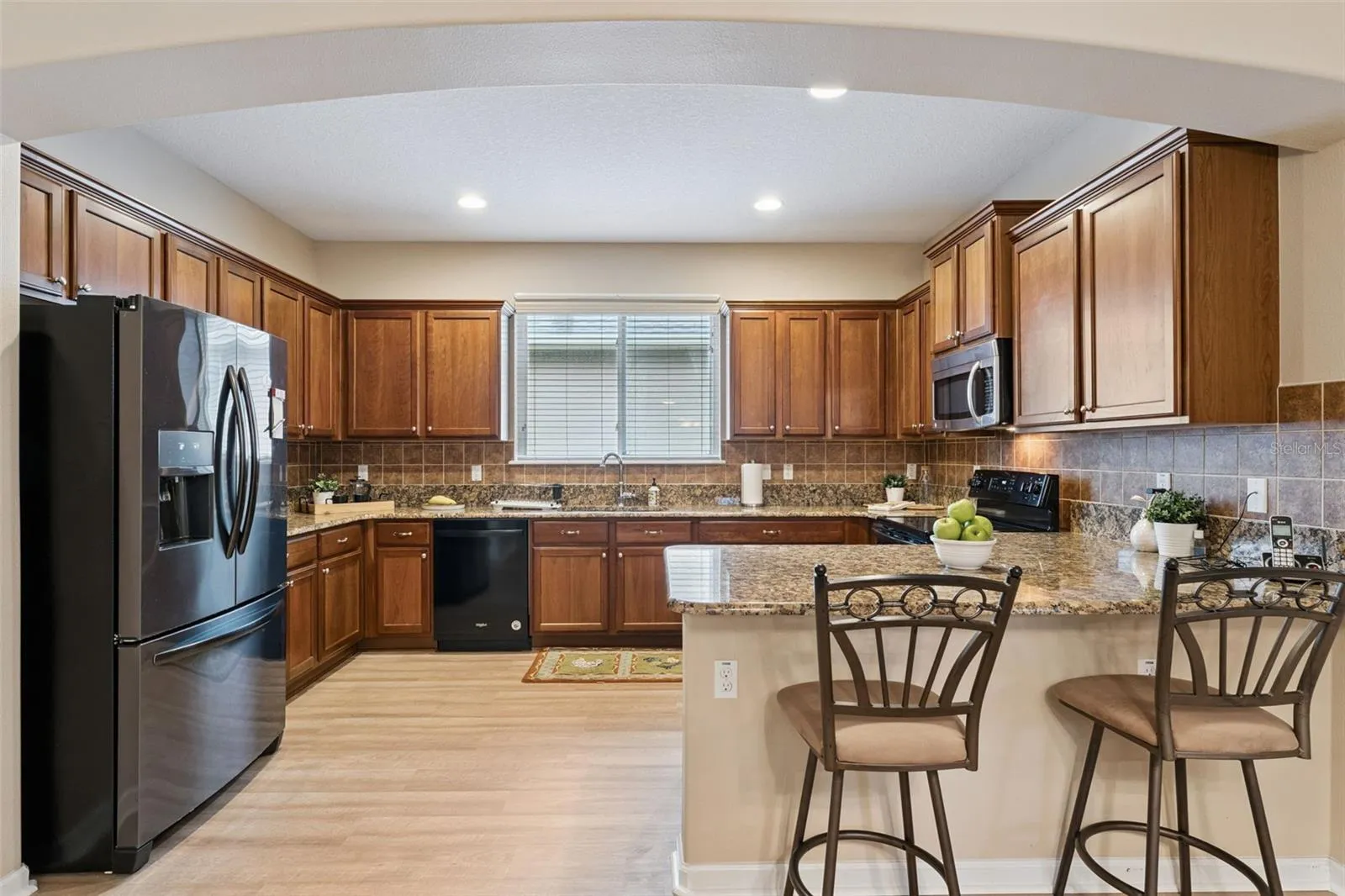 Kitchen w/ luxury vinyl flooring
