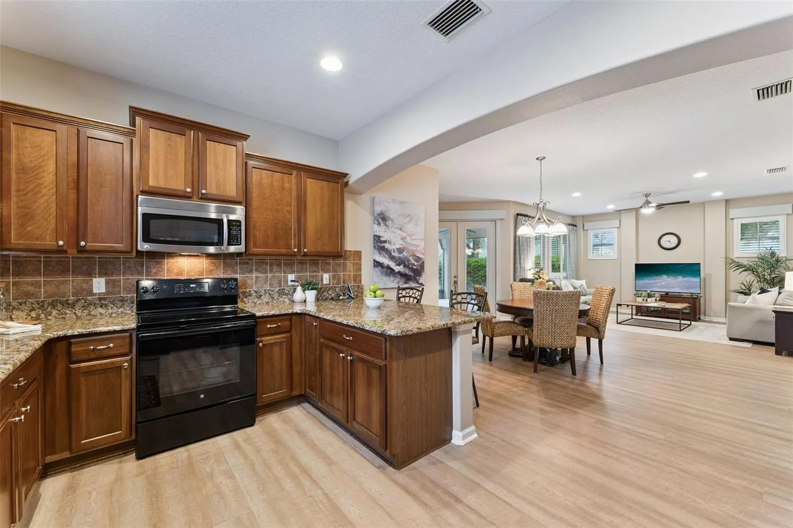 View from the Kitchen to the Dining & Great Room areas