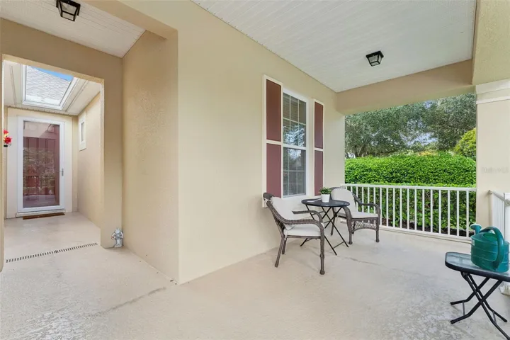 Spacious 13'6" x 8' Front Porch & glass storm door at Front Door