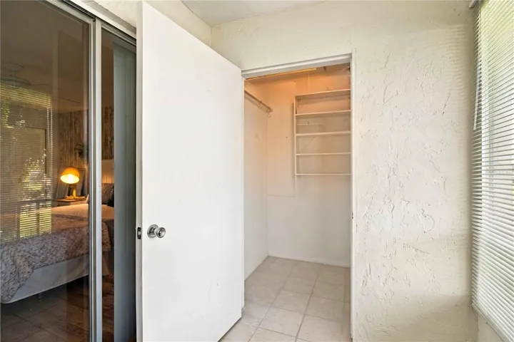 Storage closet on balcony (some totes items have been removed from the image, they will go with the seller)