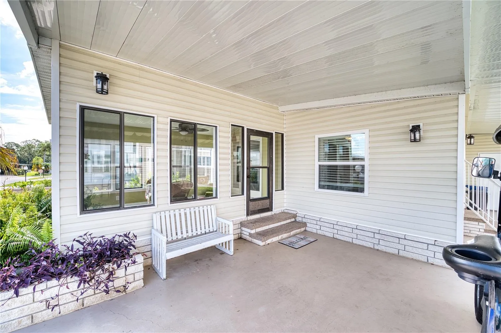 Front covered porch leading to Florida Room