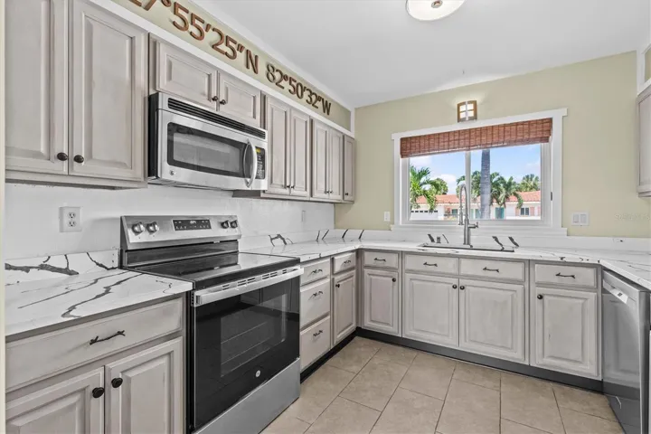 Spacious kitchen with lots of counter space and natural light.