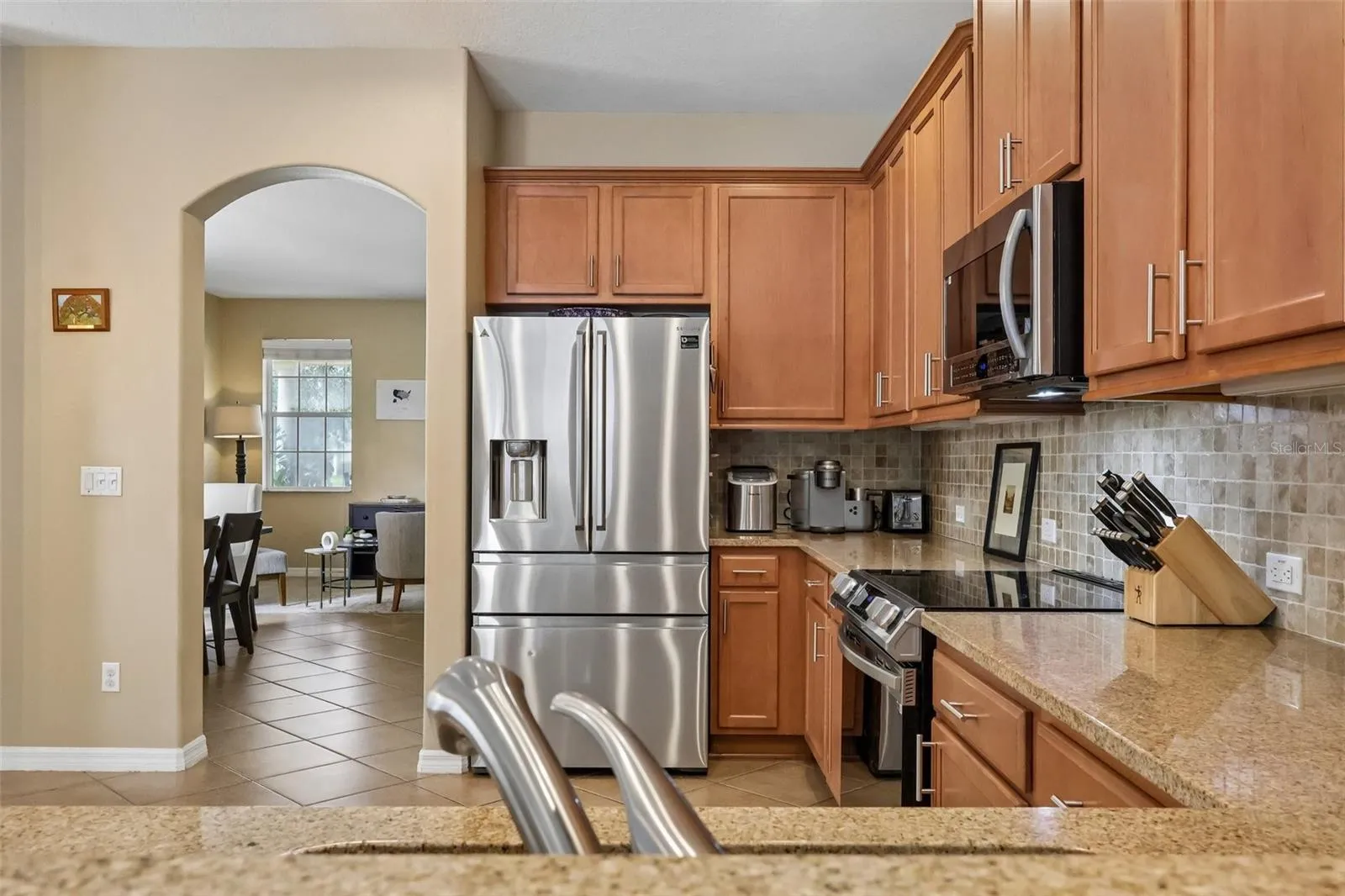 The formal dining room is easily accessible from the kitchen, perfect for entertaining!