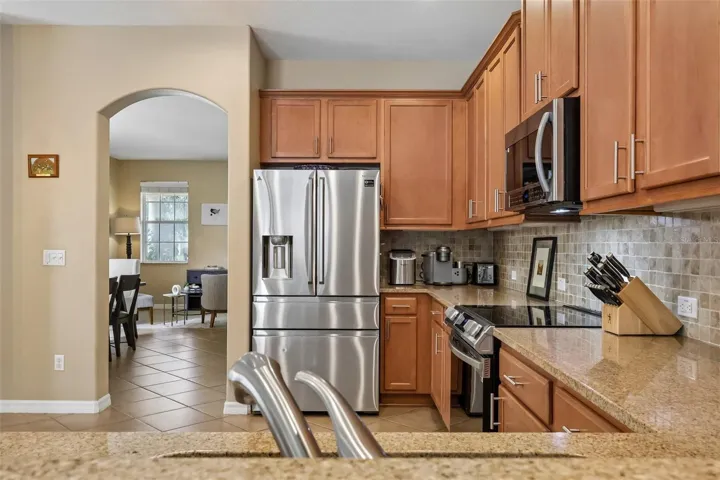 The formal dining room is easily accessible from the kitchen, perfect for entertaining!