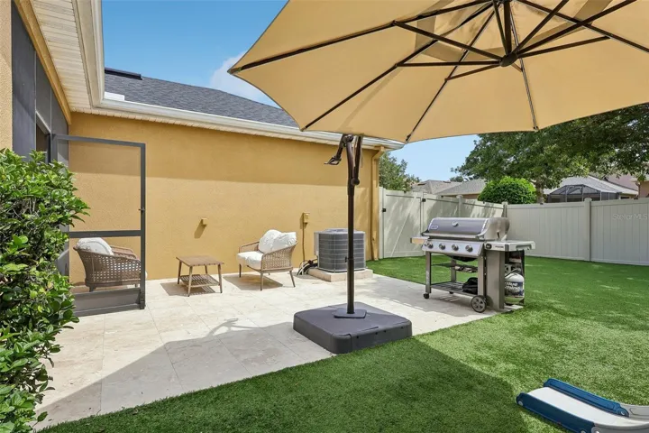 Backyard with travertine tile