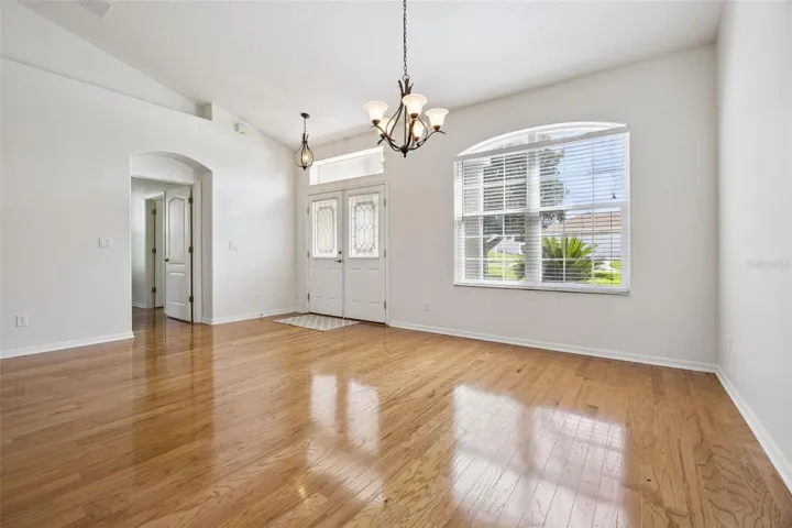 Dining Room/Living Room combo w/wood floors.