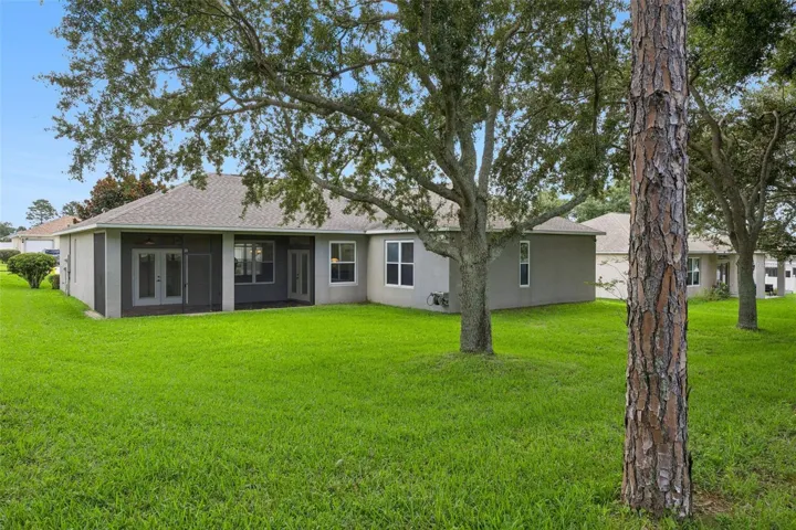 Large level lot w/mature landscaping & trees