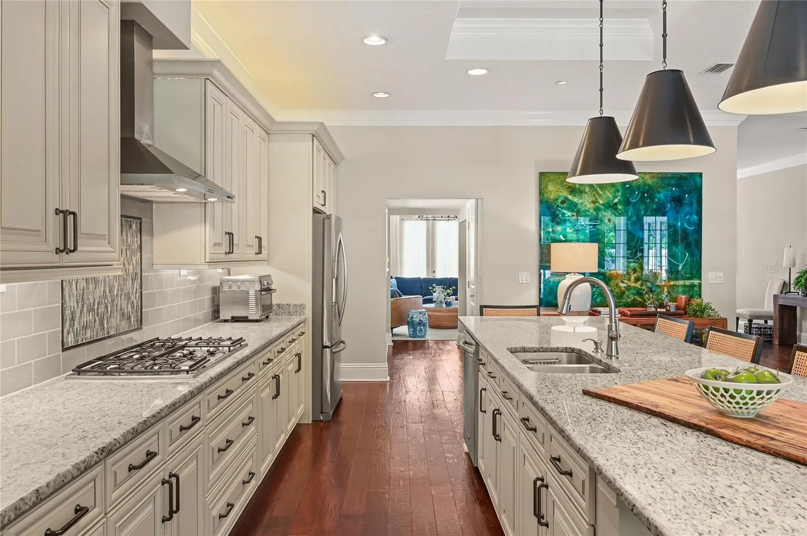 Hardwood is continuous, making the space live large.
