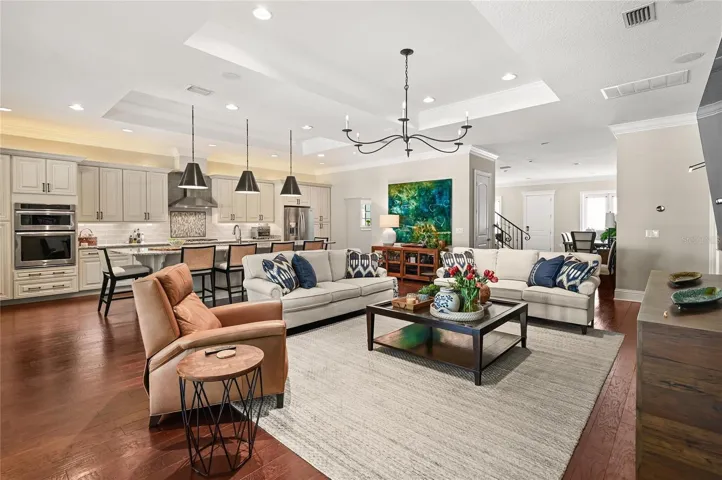 10-foot ceilings are accentuated by tray ceilings and feature recessed lighting, art lighting, and high-end decorative lighting.