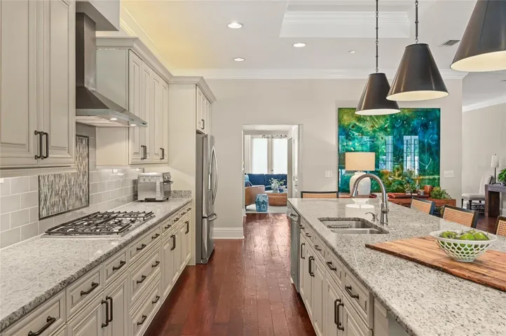 Hardwood is continuous, making the space live large.