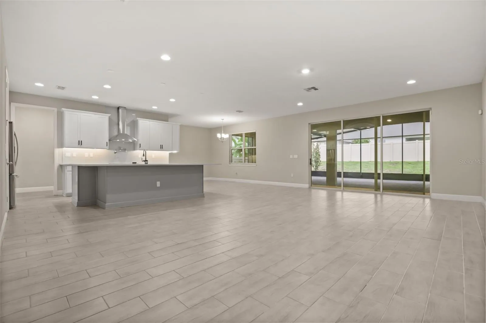 Open floor plan with triple slider leading to back Lanai