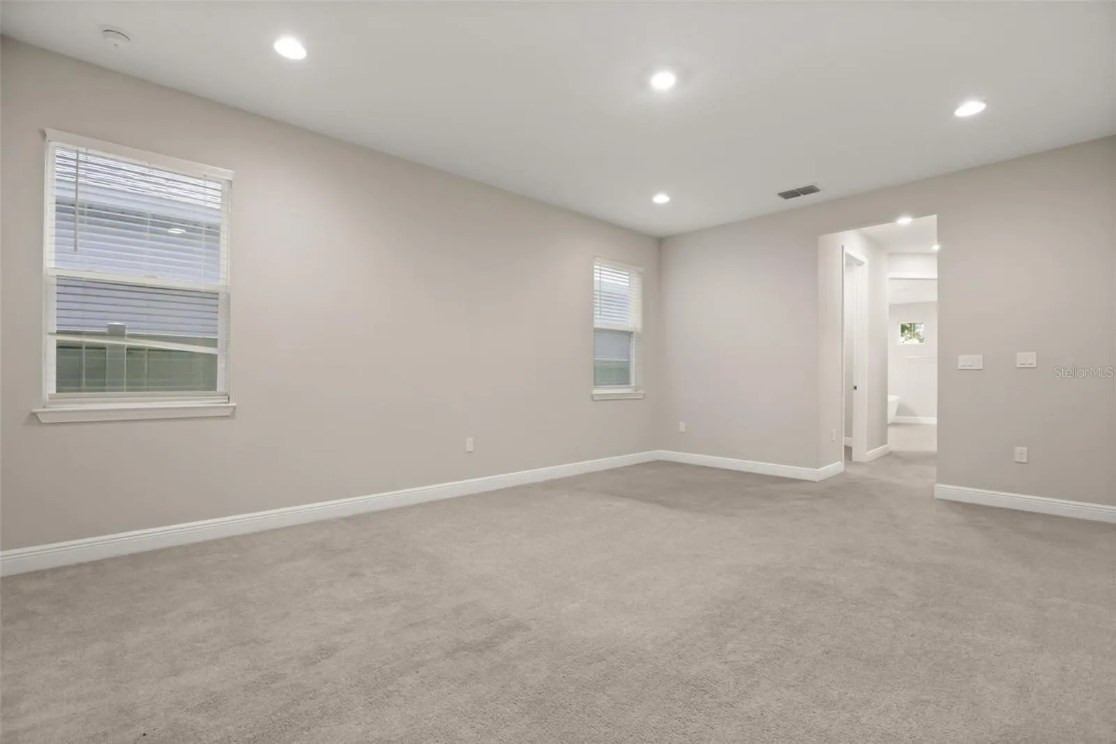 Master bedroom With his and hers closets