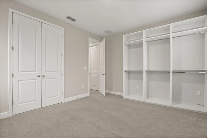 Guest bedroom 1 or storage/closet for media room