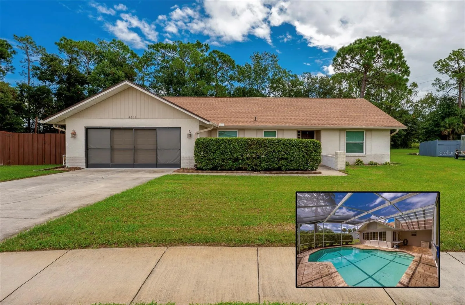 Single-story home with an attached two-car garage, spacious driveway, mature landscaping, and a well-maintained lawn, with an inset view showcasing the screened-in swimming pool and outdoor living area.