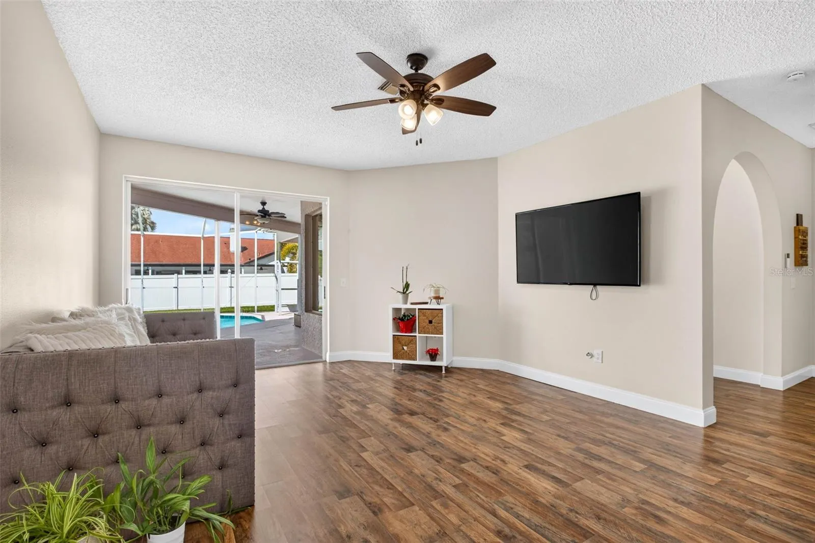 Formal living space and view to screened pool