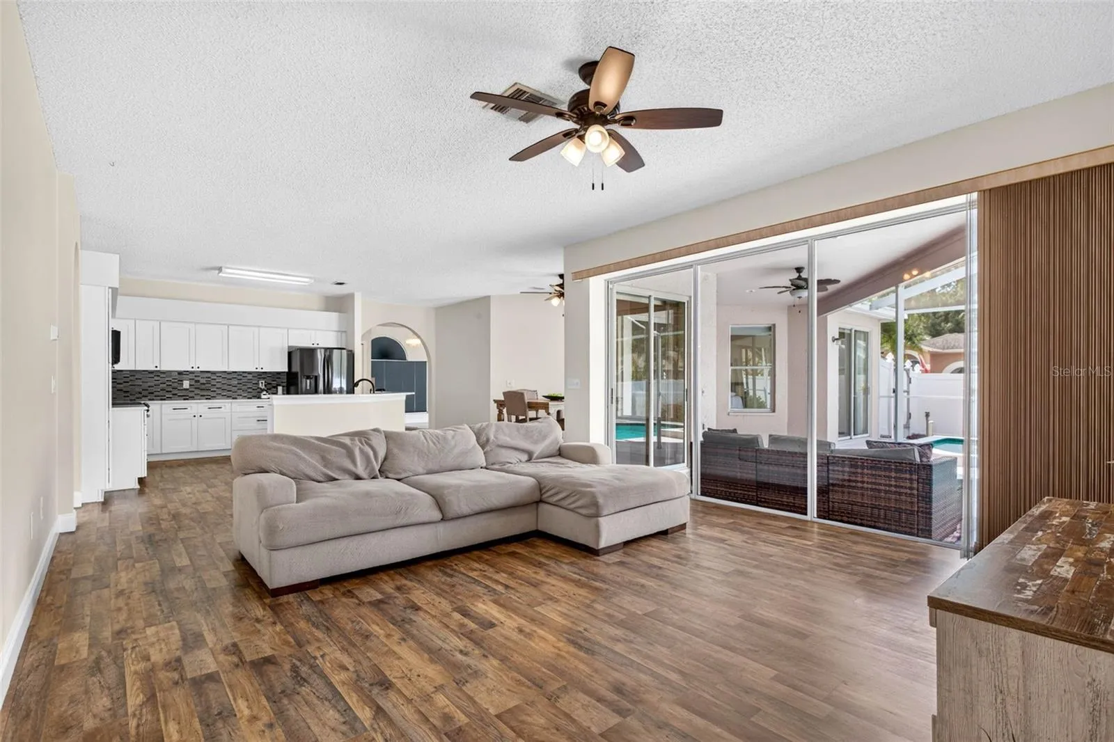 Large family room adjacent to kitchen