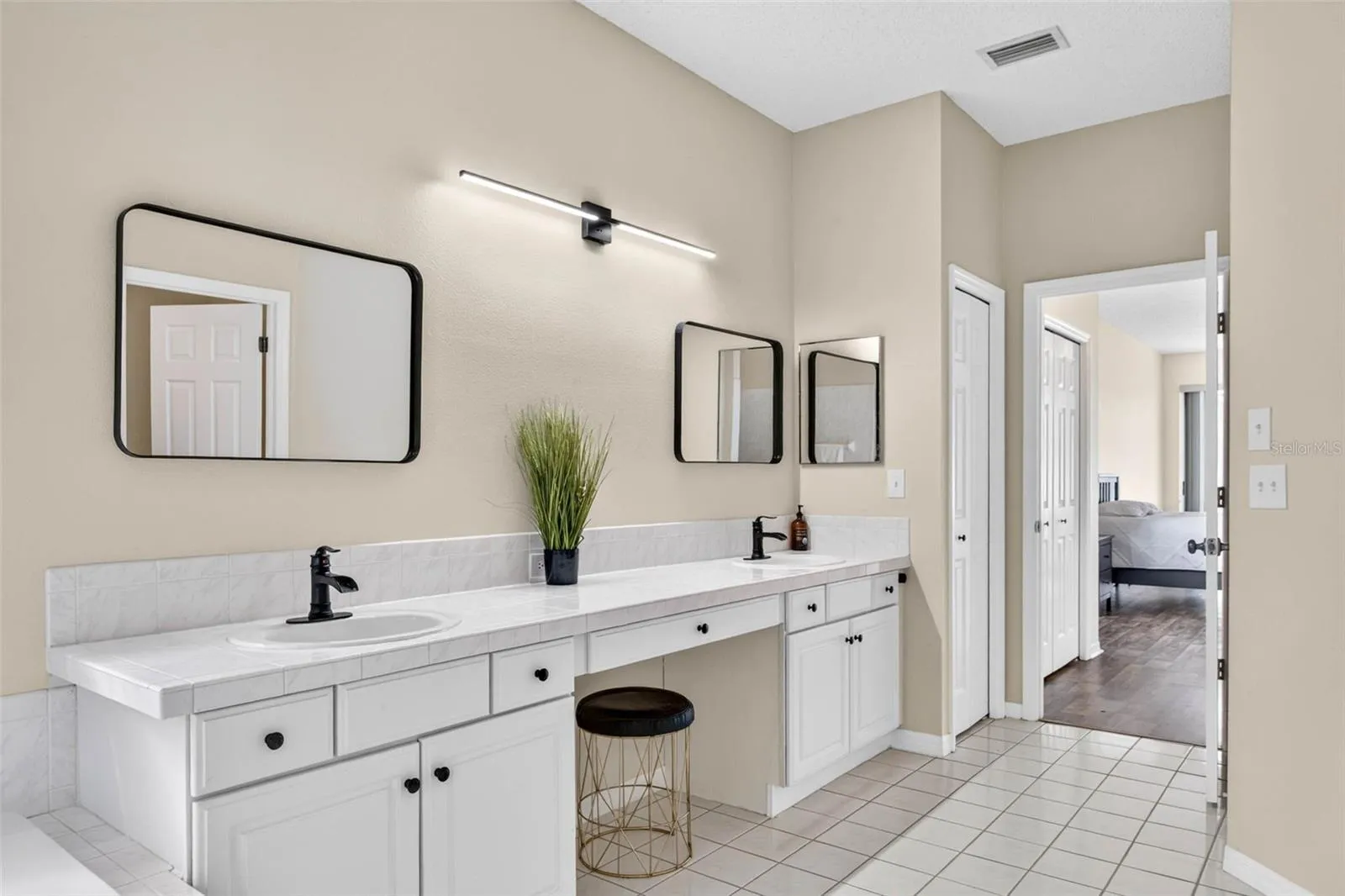 Large primary bath with shower and separate garden tub