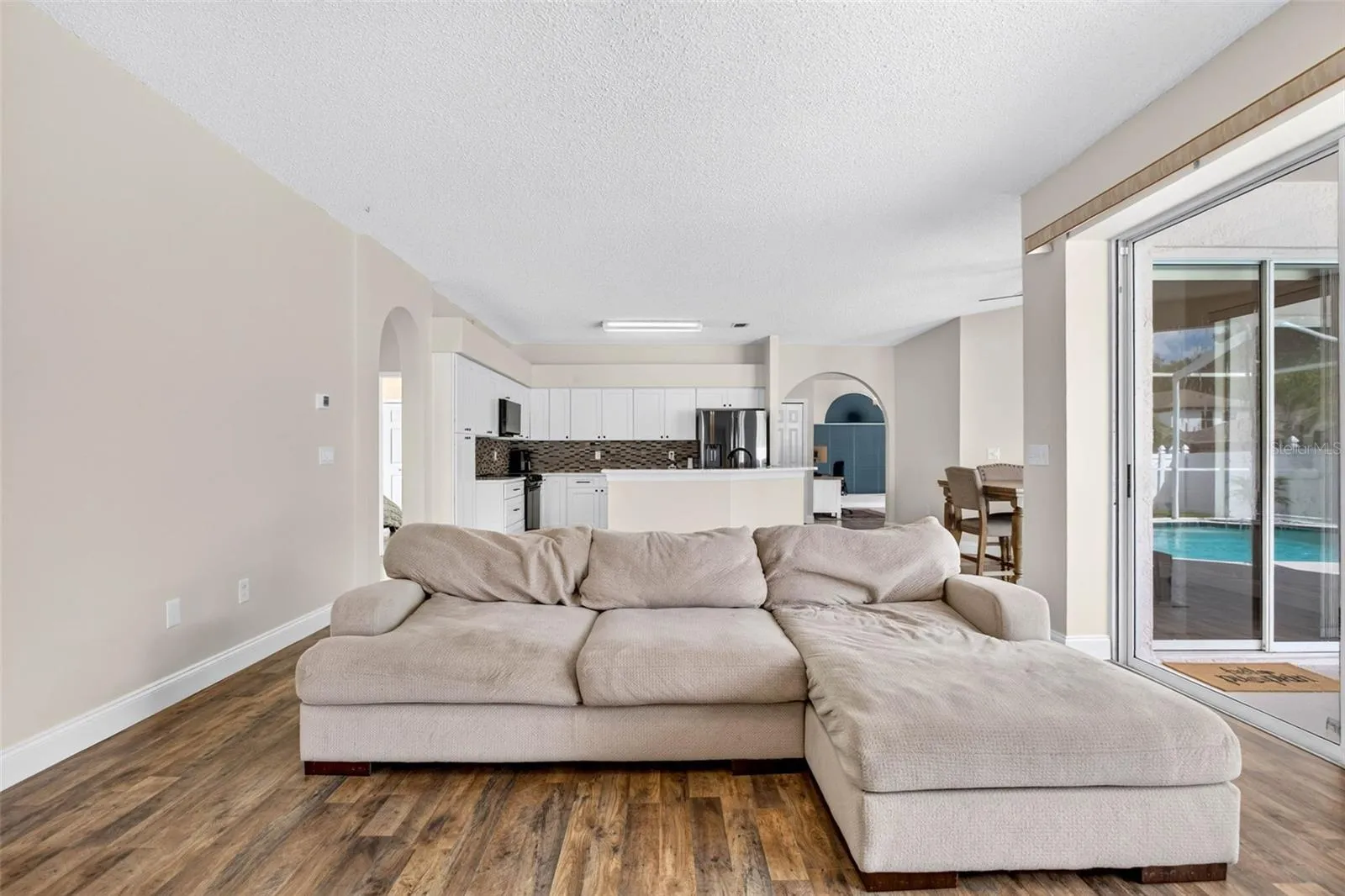 Large family room adjacent to kitchen