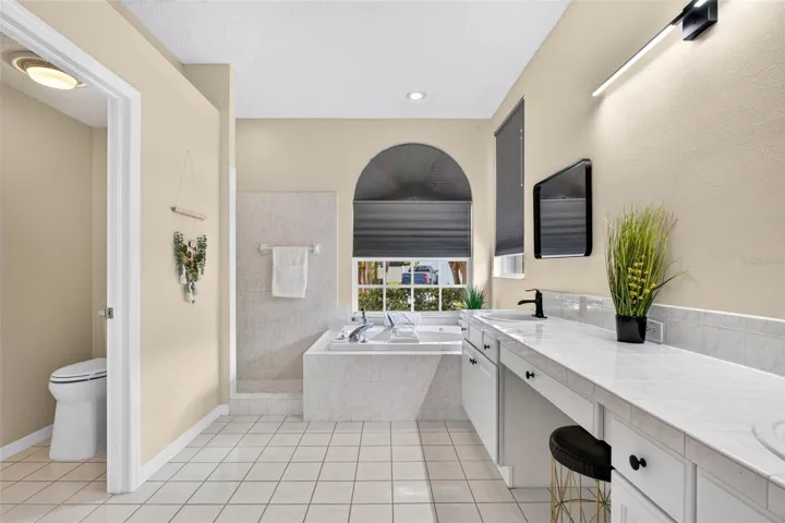Large primary bath with shower and separate garden tub