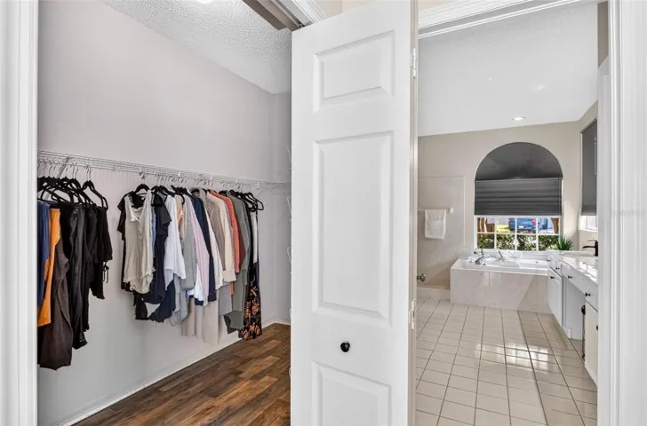 Large walk-in closet in primary suite