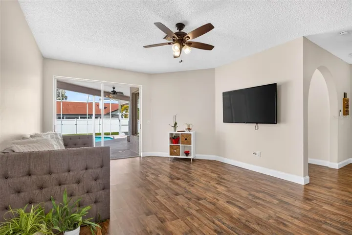 Formal living space and view to screened pool