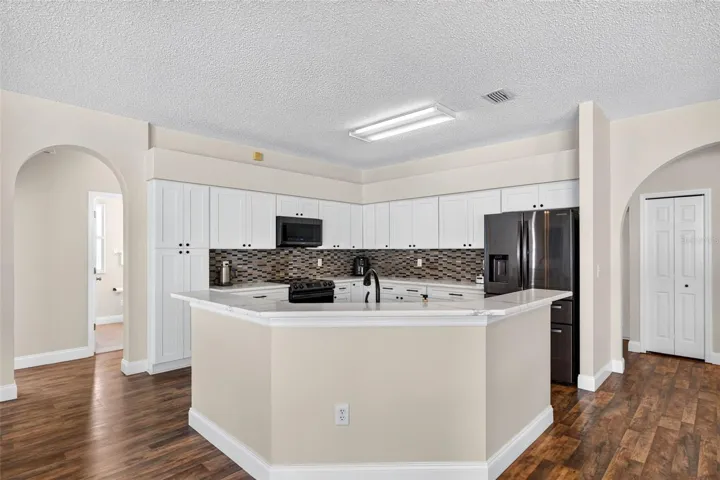 UPDATED kitchen with Quartz countertops and stainless appliances