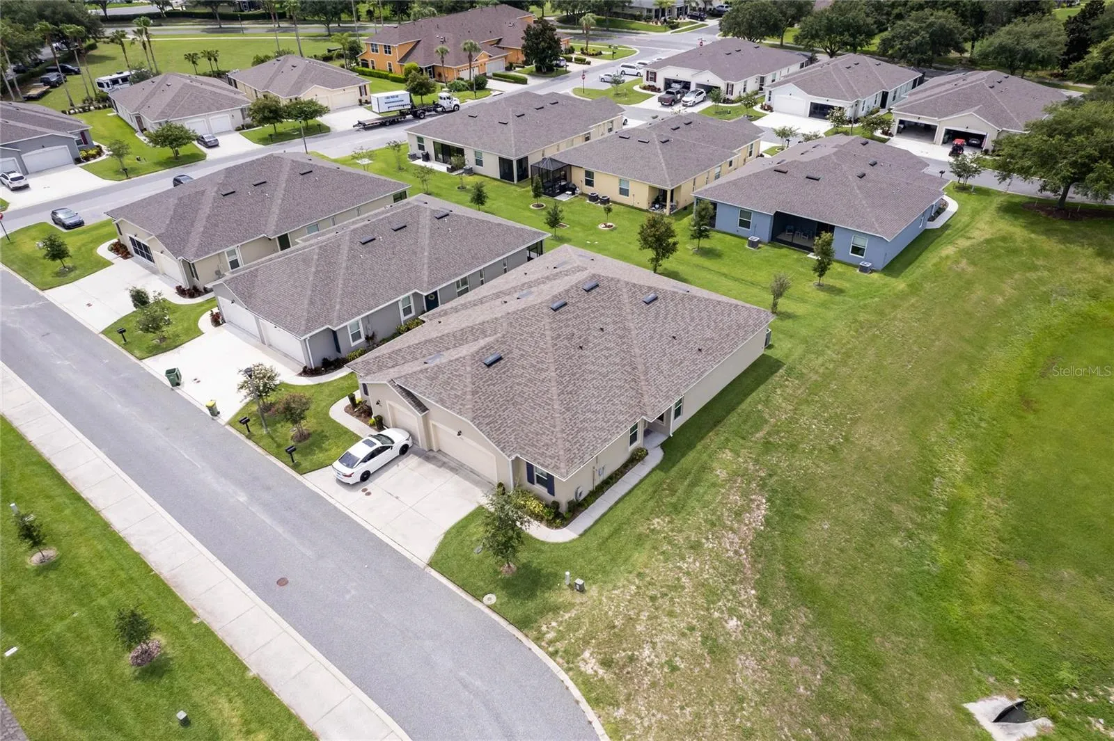 Villa on the right. Double car driveway and 20x20 garage with overhead storage.