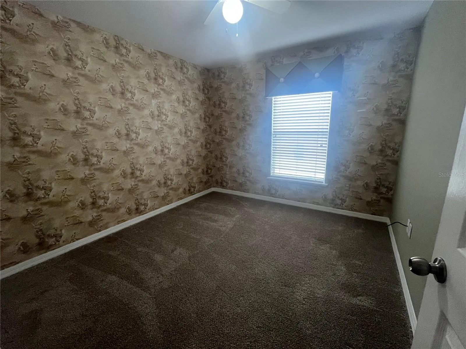 Room could be possibly painted if tenant does not like wallpaper