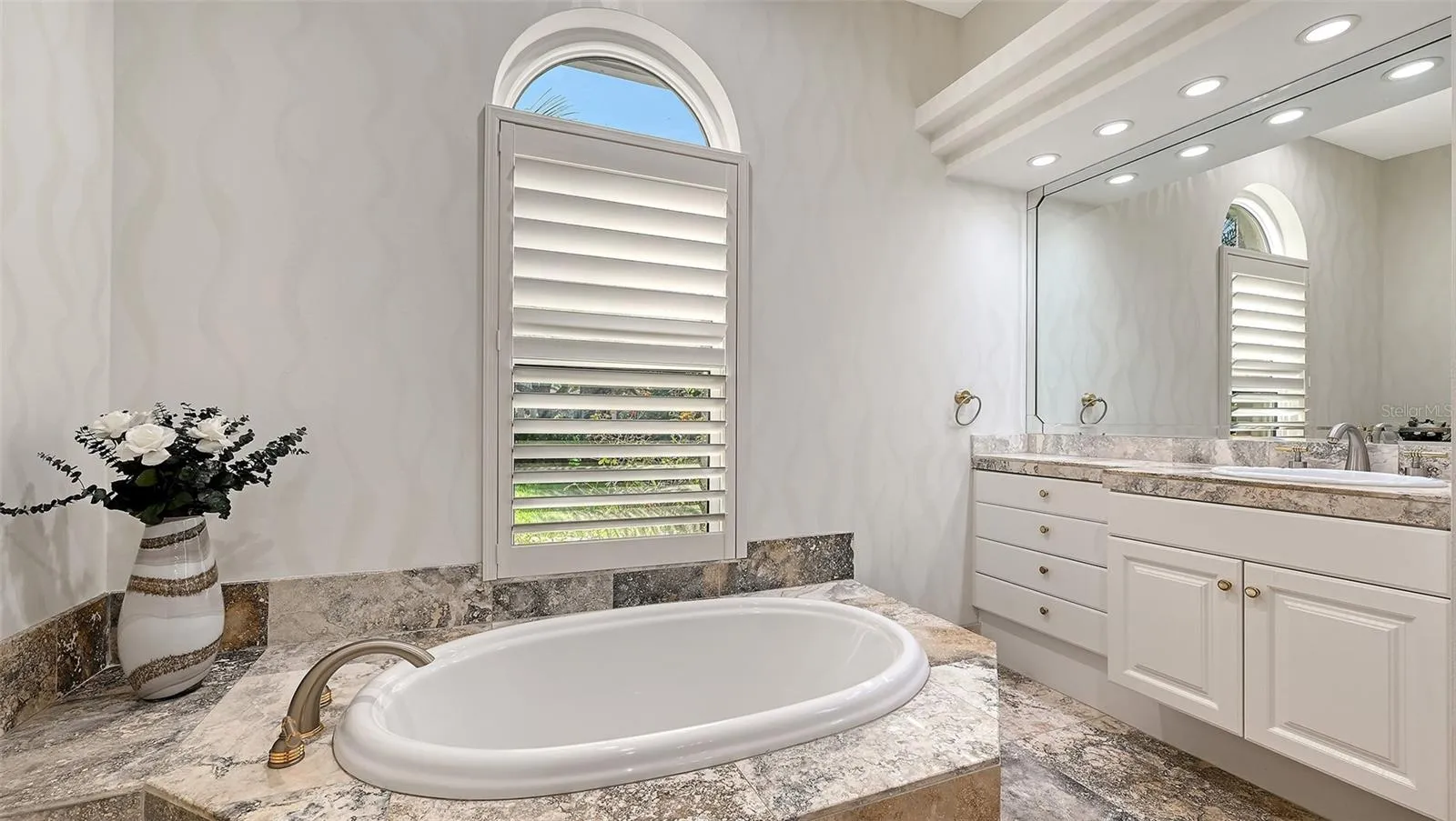 Primary Bathroom with separate Tub.