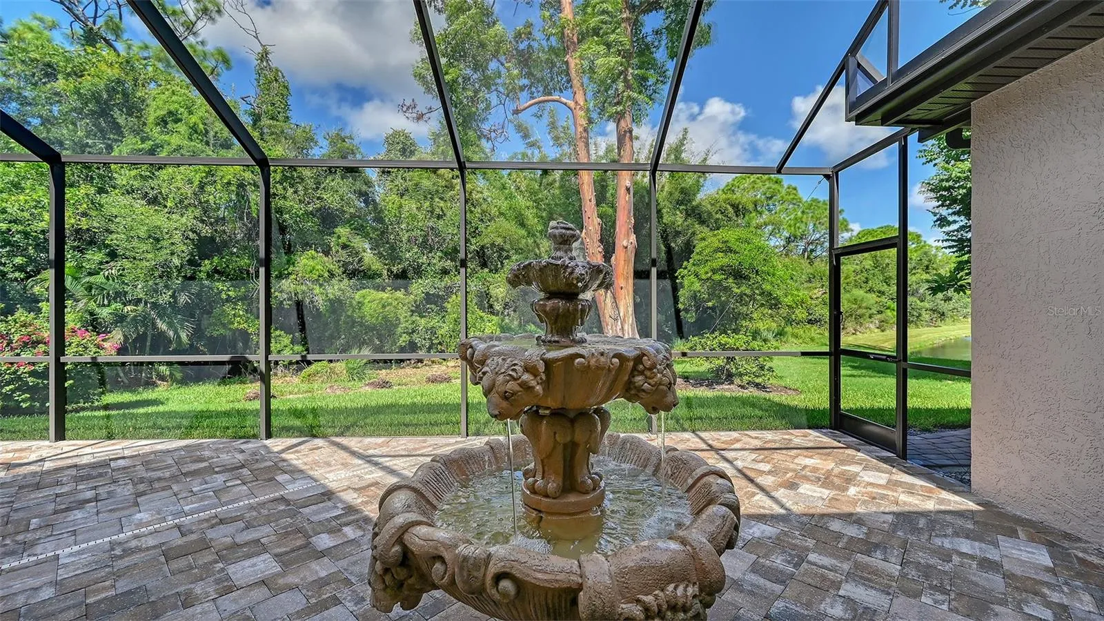 Side screen pool area with fountain.
