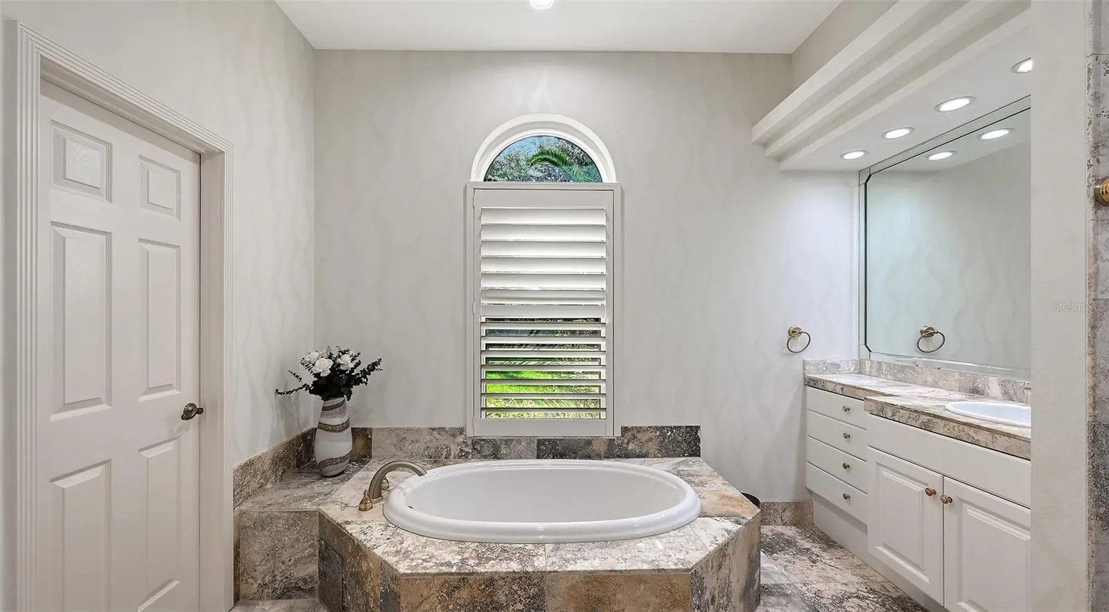 Primary Bathroom separate Tub.