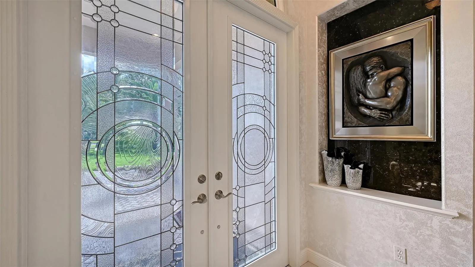 Double paned glass entry door.