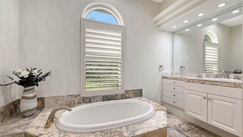 Primary Bathroom with separate Tub.