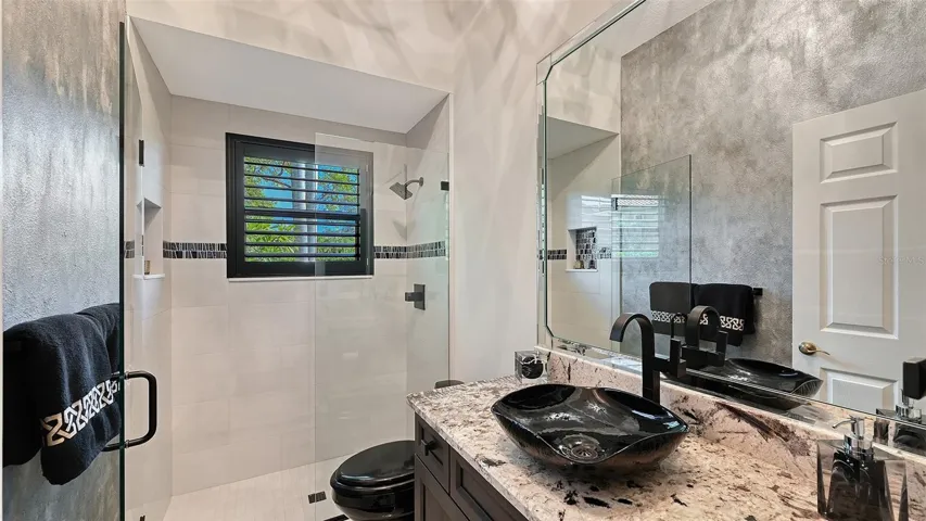 Third Bathroom - also the pool bath and next to the Fourth Bedroom.