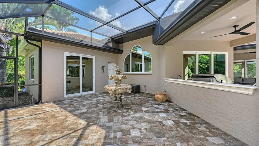 Side screen pool area with fountain.