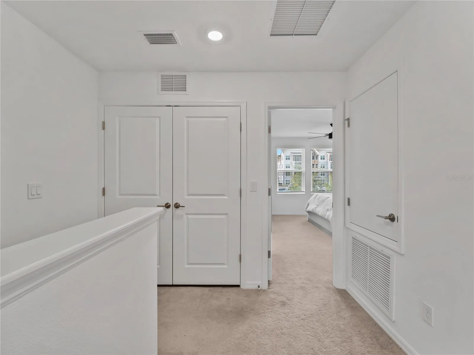 Hallway with laundry closet