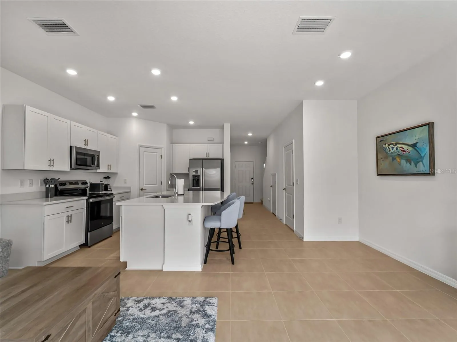 Open and inviting floor plan with 1/2 bath on first floor.